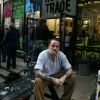 Andrew Weatherall sat outside Rough Trade East